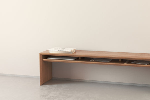 A Japanese minimalist style solid wooden bench made from oak.